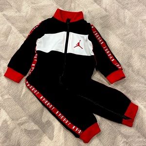 Jordyn black red coverall/1 piece track suit - EUC